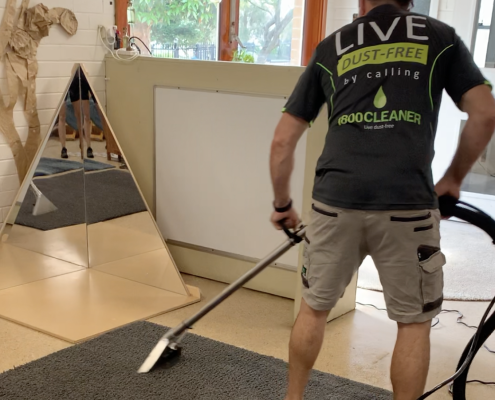 Man offering carpet cleaning services in Sydney