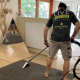 Man offering carpet cleaning services in Sydney