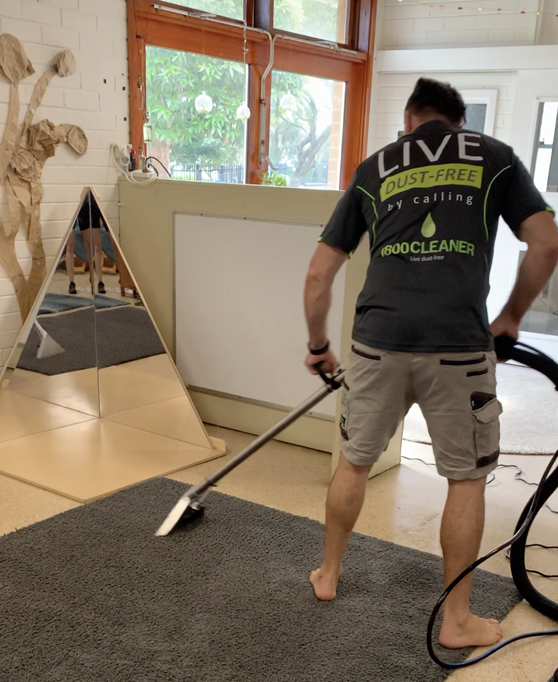 Man offering carpet cleaning services in Sydney